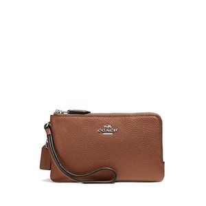Coach brand wristlet in saddle color NWT
